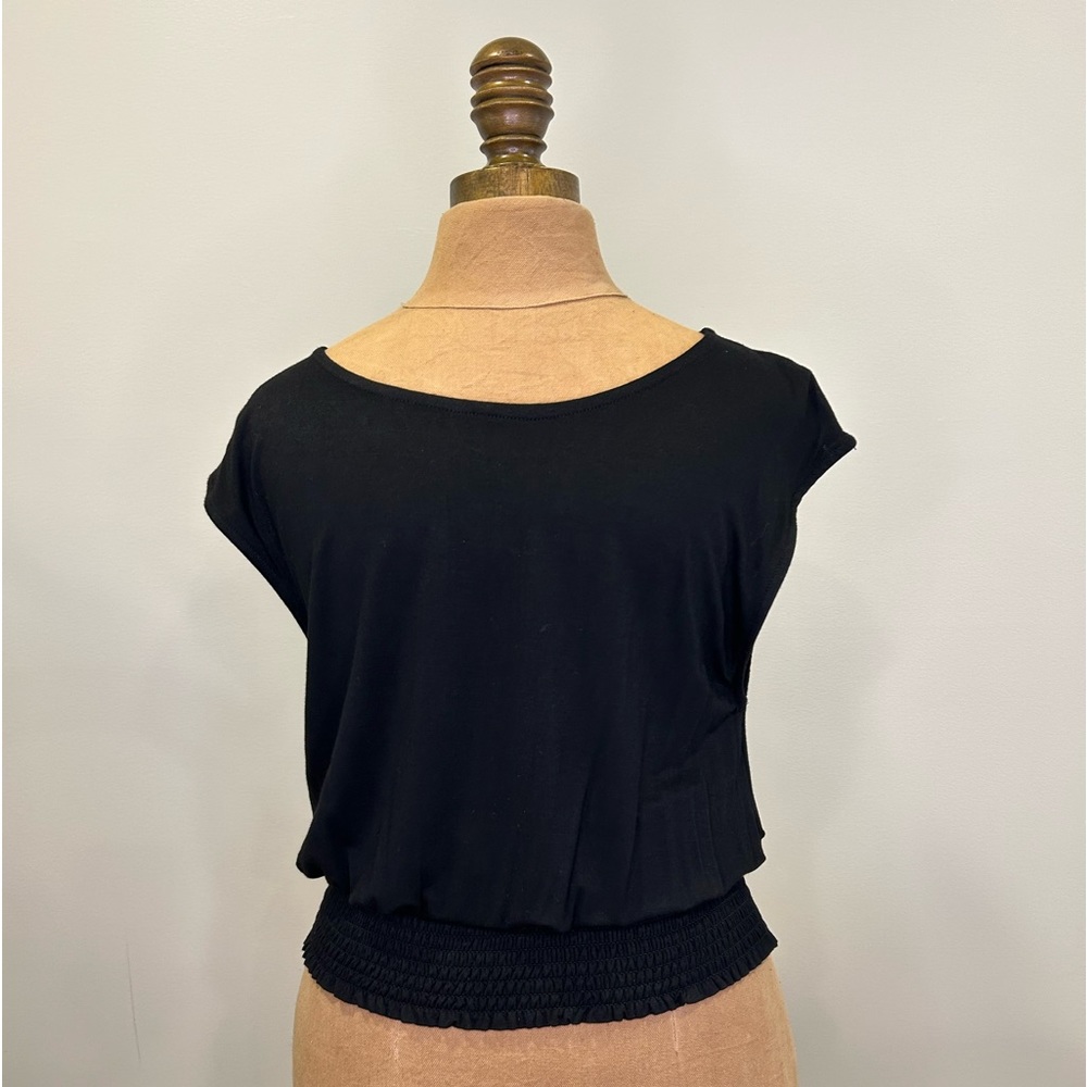 Anthropologie Small Deletta smocked waist cap sleeve top.